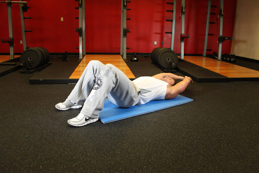 Crunch - Hands Overhead — Body Weight Abdominals exercise demonstration