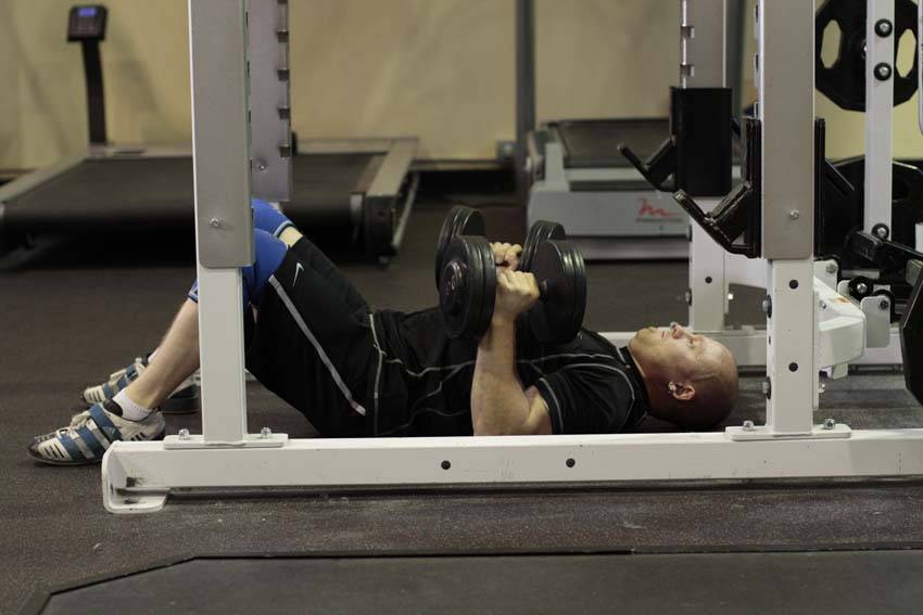 Dumbbell Floor Press — Dumbbell Triceps exercise demonstration