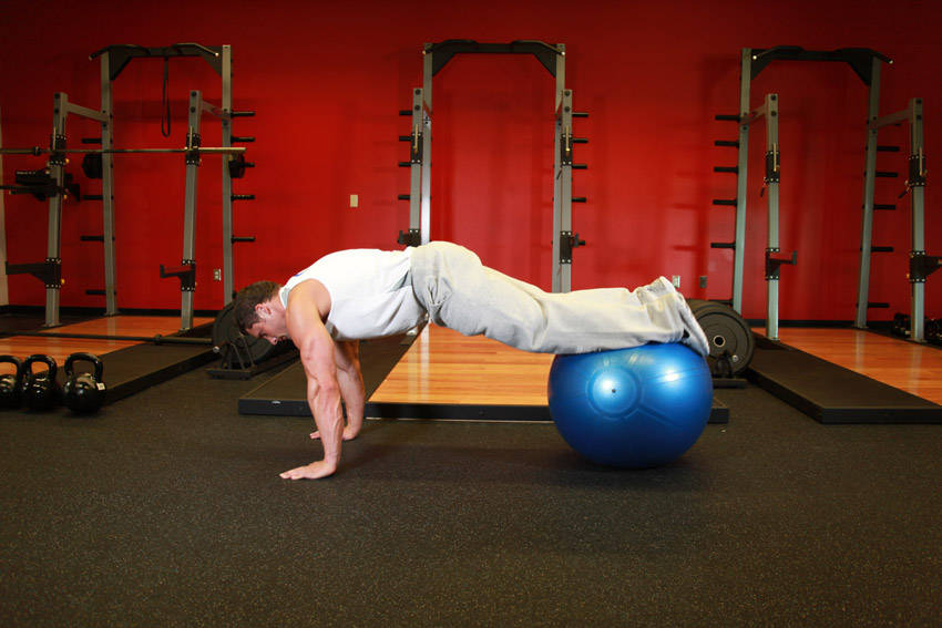 Exercise Ball Pull-In — Stability Ball Abdominals exercise demonstration