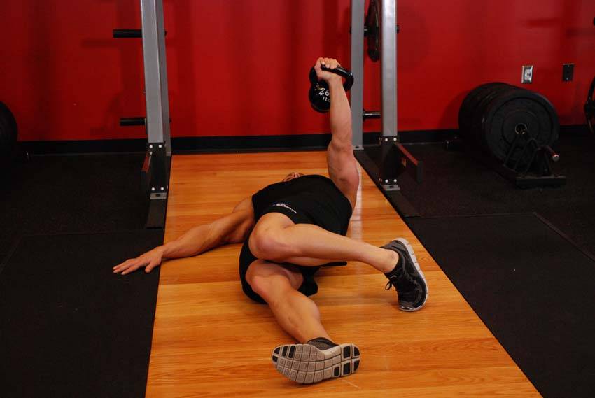 Extended Range One-Arm Kettlebell Floor Press — Kettlebell Chest exercise demonstration