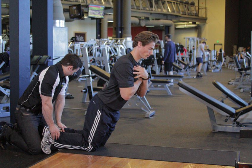 Floor Glute-Ham Raise — Body Weight Hamstrings exercise demonstration