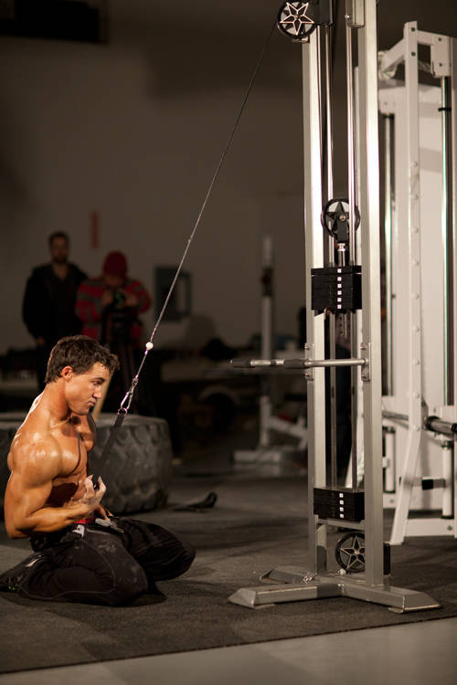 Kneeling Single-Arm High Pulley Row — Cable Lats exercise demonstration