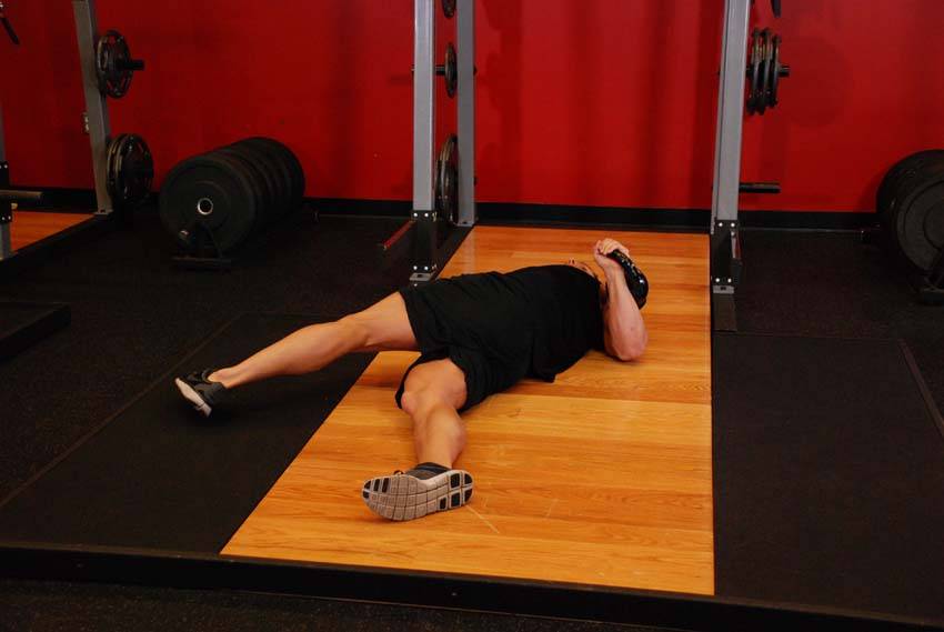 Leg-Over Floor Press — Kettlebell Chest exercise demonstration