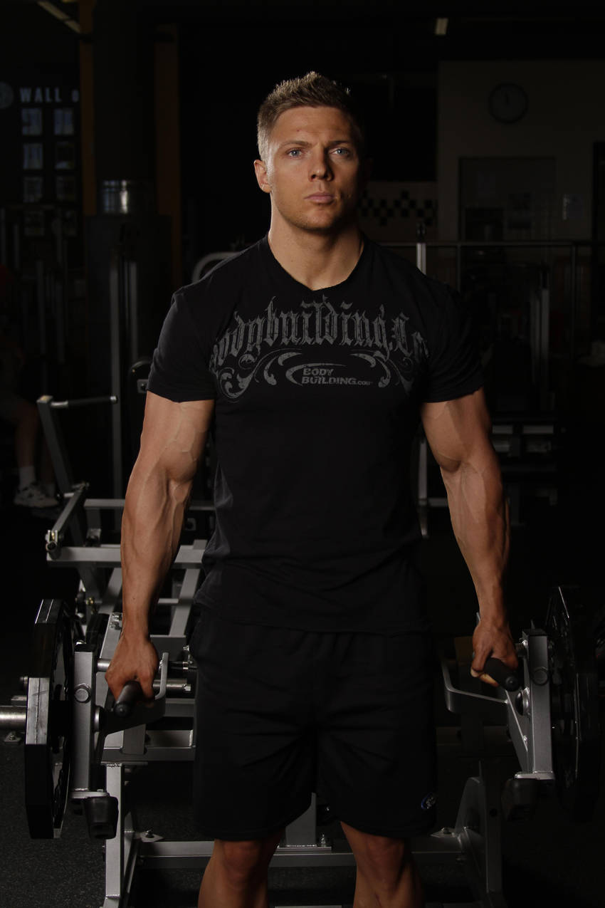 Leverage Shrug — Machine Trapezius exercise demonstration