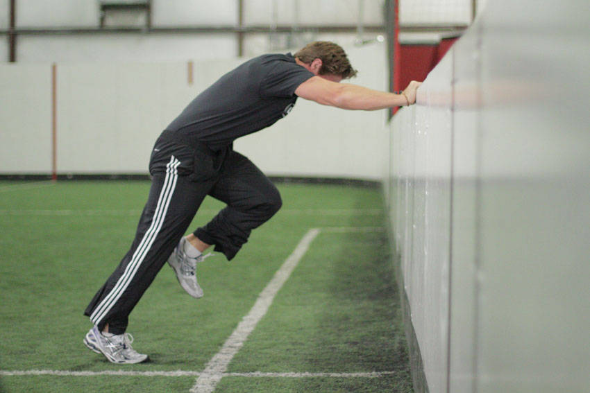 Linear Acceleration Wall Drill — Body Weight Hamstrings exercise demonstration