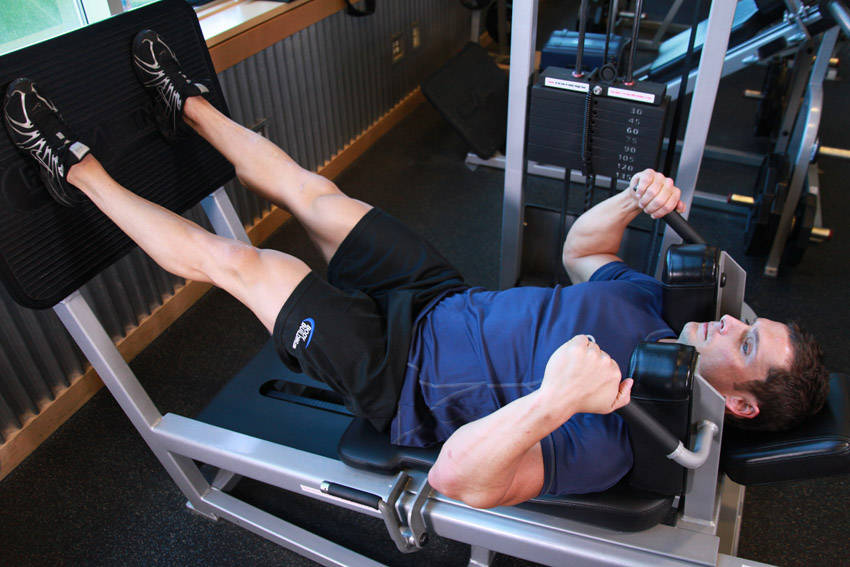 Lying Machine Squat — Machine Quadriceps exercise demonstration