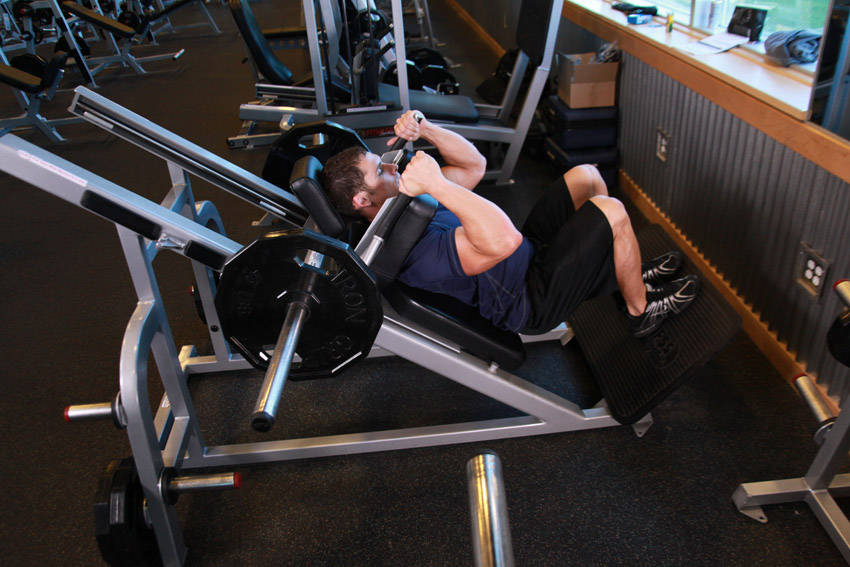 Narrow Stance Hack Squats — Machine Quadriceps exercise demonstration