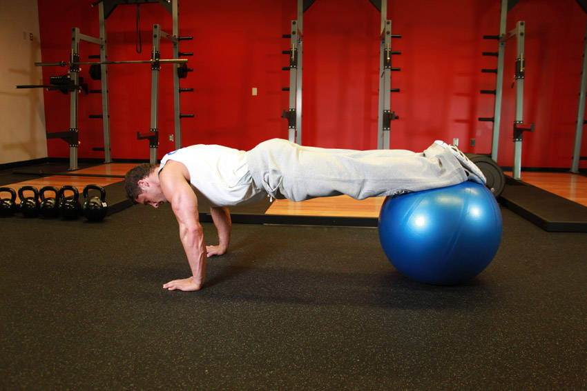 Push-Ups With Feet On An Exercise Ball — Stability Ball Chest exercise demonstration