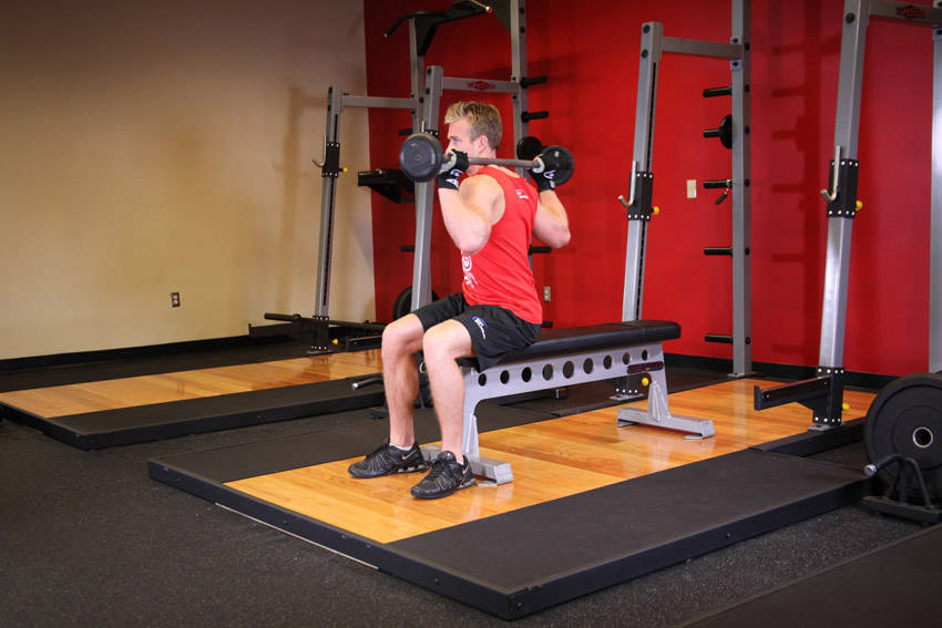 Seated Barbell Twist — Barbell Abdominals exercise demonstration