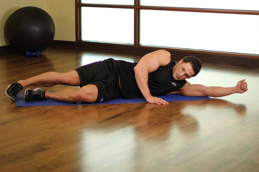 Side-Lying Floor Stretch — Body Weight Lats exercise demonstration
