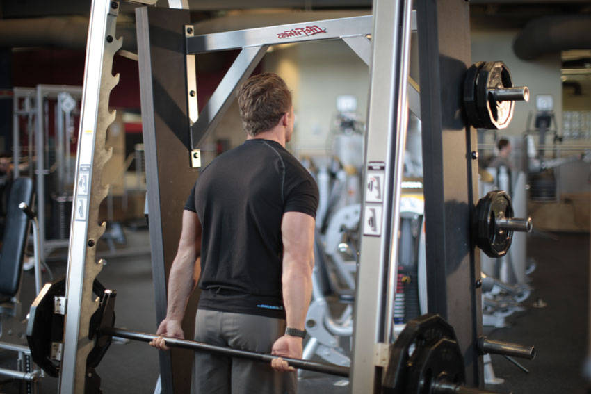 Smith Machine Behind the Back Shrug — Machine Trapezius exercise demonstration