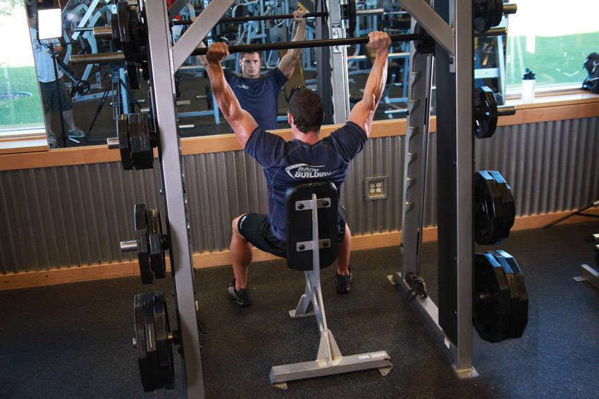 Smith Machine Overhead Shoulder Press — Machine Shoulders exercise demonstration