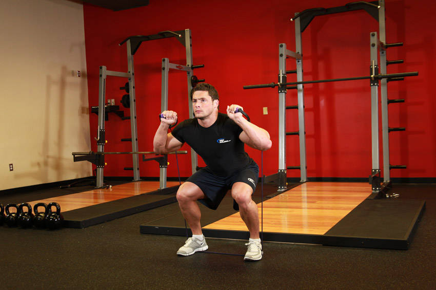 Squats - With Bands — Band Quadriceps exercise demonstration