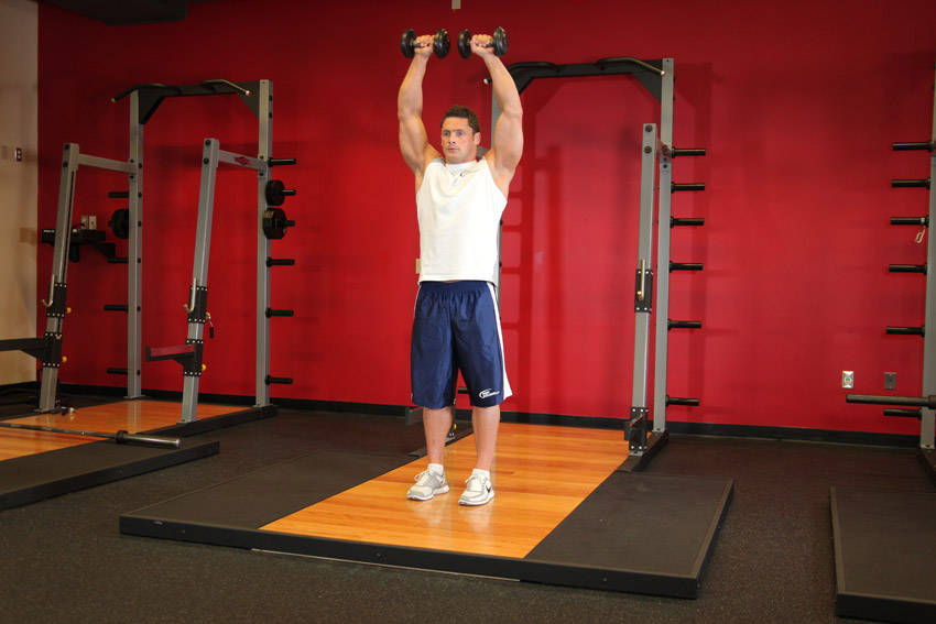 Standing Dumbbell Straight-Arm Front Delt Raise Above Head — Dumbbell Shoulders exercise demonstration