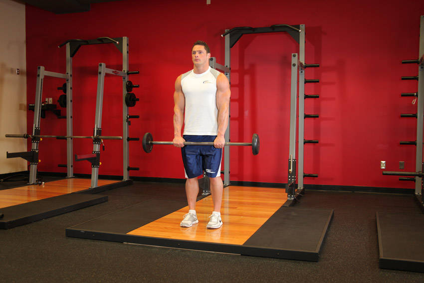 Standing Front Barbell Raise Over Head — Barbell Shoulders exercise demonstration