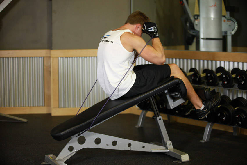 Weighted Sit-Ups - With Bands — Other Abdominals exercise demonstration