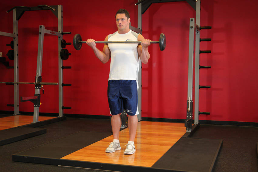 Wide-Grip Standing Barbell Curl — Barbell Biceps exercise demonstration