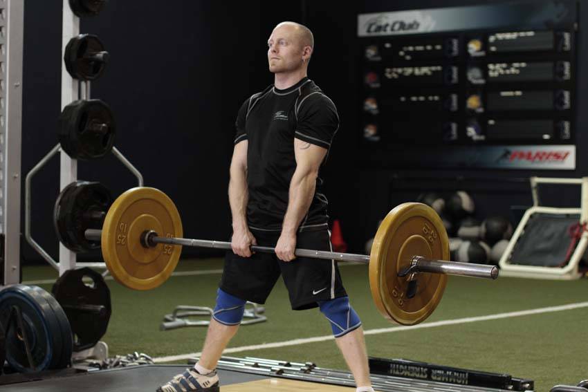Wide Stance Stiff Legs — Barbell Hamstrings exercise demonstration